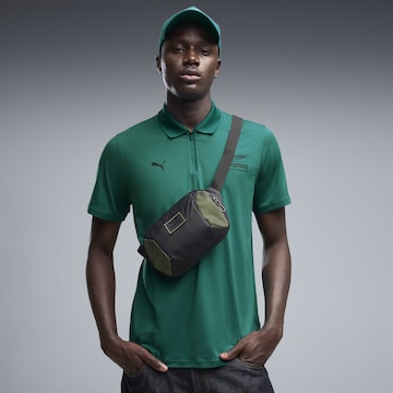 PUMA Sport heuptas 'PUMA x ASTON MARTIN ARAMCO F1® TEAM' in Zwart: voorkant