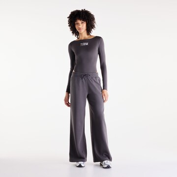 new balance Sportbody 'Trackside Long Sleeve Bodysuit' in Zwart