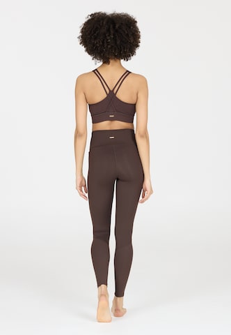 Athlecia Skinny Sports trousers 'Aliya' in Brown