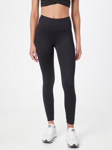 Skinny Pantalon de sport Röhnisch en noir : devant