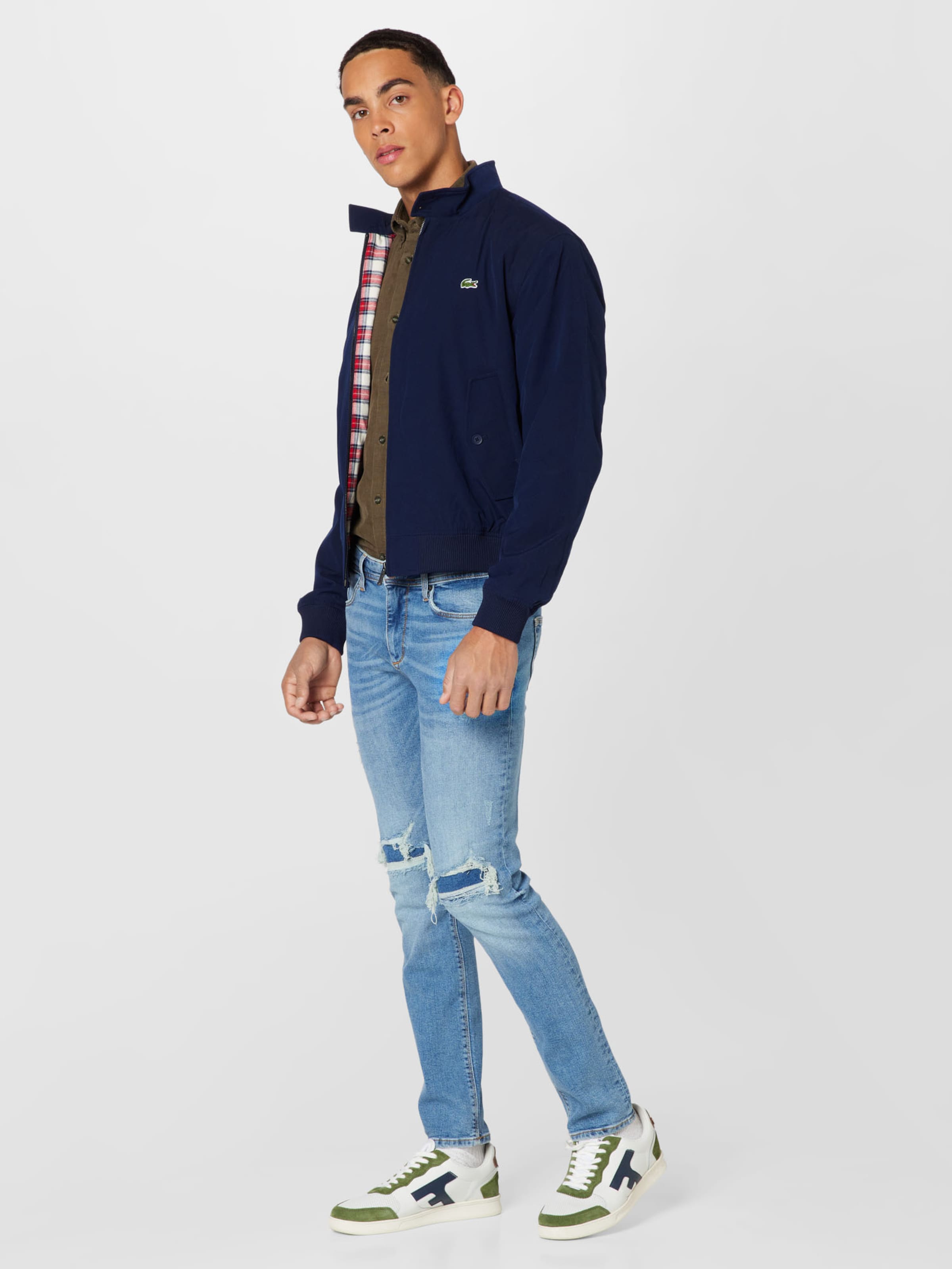 Veste mi saison LACOSTE en Bleu Marine ABOUT YOU