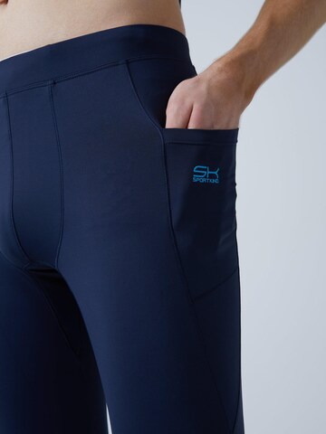 Coupe slim Pantalon de sport 'Long Running Tights' SPORTKIND en bleu