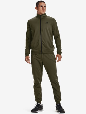 UNDER ARMOUR Tapered Sportbroek in Groen