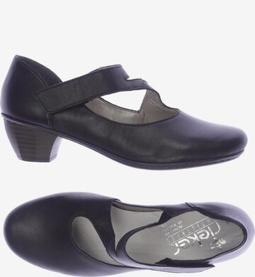 Rieker Flats & Loafers in 37 in Black: front