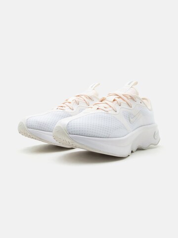NIKE Urheilukengät 'Motiva 2' värissä valkoinen
