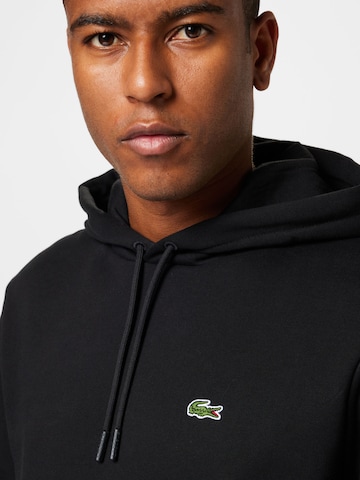 LACOSTE - Sudadera en negro