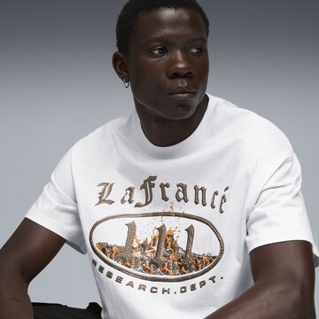 PUMA Performance shirt 'LaFrance Heem' in Grey
