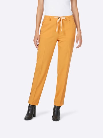 Regular Pantalon à plis heine en orange : devant