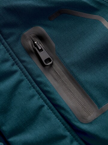 Next - Chaqueta funcional en azul