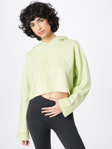 NIKE Sport sweatshirt i gul: framsida