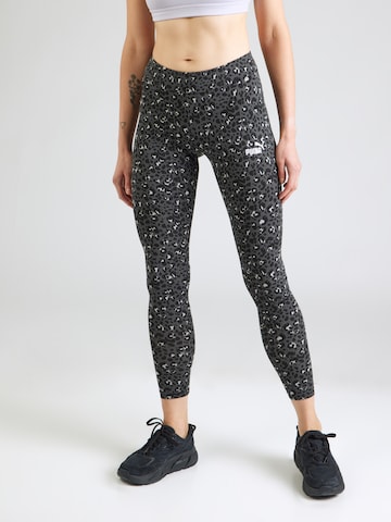 PUMA Skinny Urheiluhousut 'Essentials' värissä musta: etupuoli