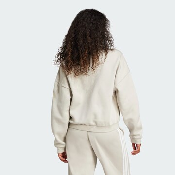 ADIDAS SPORTSWEAR - Sudadera con cremallera deportiva 'Essentials' en beige