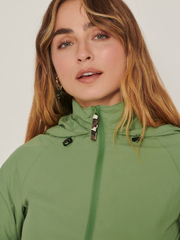 ABOUT YOU x Sofia Tsakiridou Between-Season Jacket 'Melek' in Green