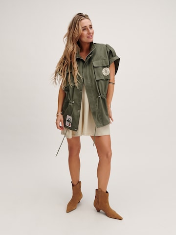 Tatiana Zidekova Väst i grön