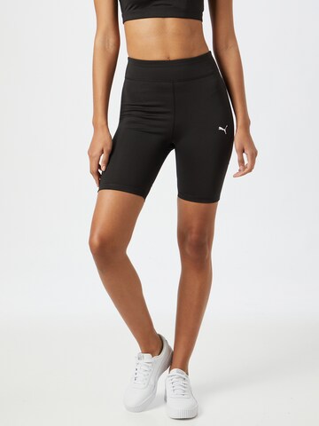 PUMA Skinny Workout Pants in Black: front