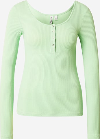 žalia PIECES Marškinėliai 'PCKITTE': priekis