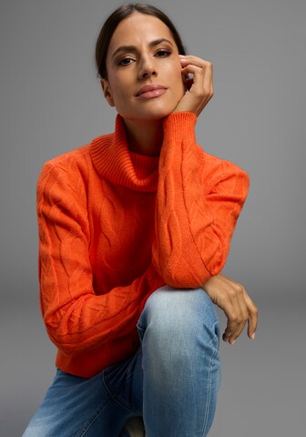 KangaROOS Sweater in Orange