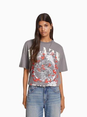 T-shirt Bershka en gris : devant