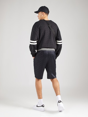 ELLESSE Loosefit Shorts 'Bezano' in Schwarz