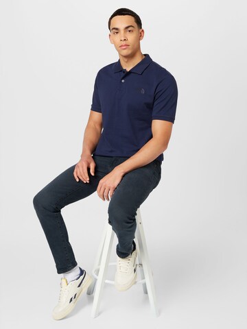 THE NORTH FACE Poloshirt in Blau