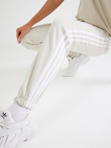 ADIDAS SPORTSWEAR Tapered Παντελόνι φόρμας 'Essentials' σε μπεζ