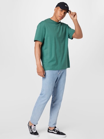 WEEKDAY Bluser & t-shirts i grøn