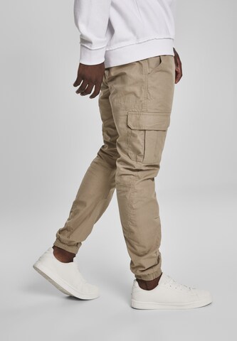 Urban Classics Tapered Cargo trousers in Beige