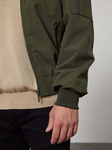 DAN FOX APPAREL Between-Season Jacket 'Kalle' in Green