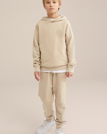 WE Fashion Конический (Tapered) Штаны в Бежевый