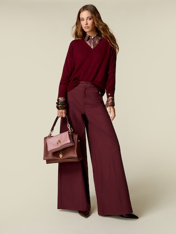 oltre Baggy Trousers in Red