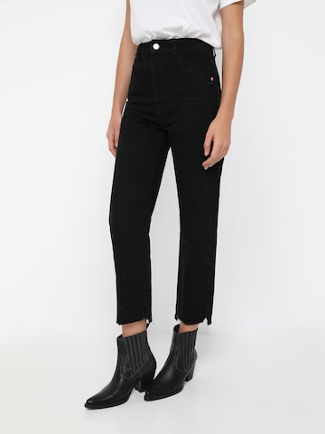 Scalpers Jeans in Black: front