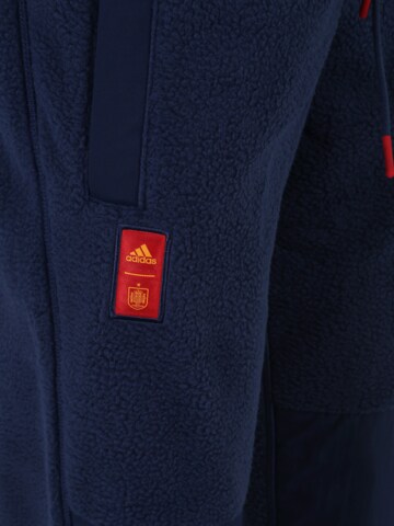 ADIDAS SPORTSWEAR Дънки Tapered Leg Спортен панталон 'Spain Lifestyler Fleece' в синьо