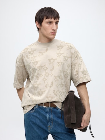 Maglietta di Carlo Colucci in beige