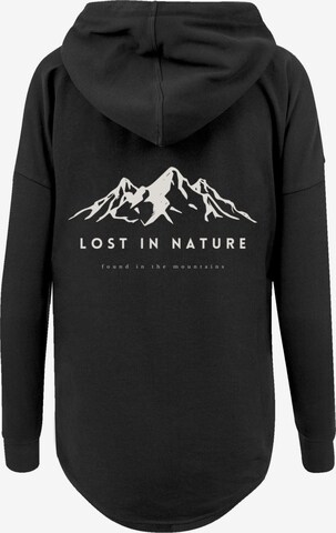 Sweat-shirt 'Lost in nature' F4NT4STIC en noir