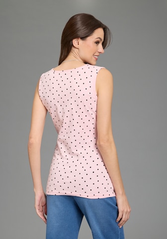 Neun Monate Top in Pink