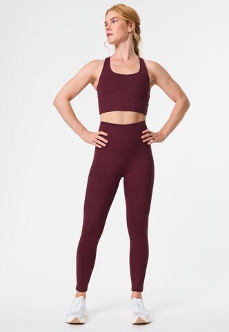 Skinny Pantalon de sport Girlfriend Collective en rouge