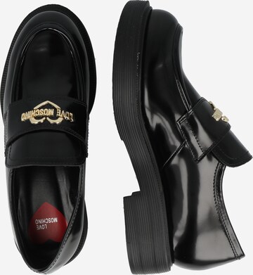 Slipper 'CITY LOVE' di Love Moschino in nero