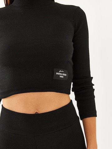 Pantalons de tailleur Bianco Lucci en noir