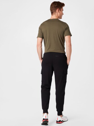 Effilé Pantalon cargo PUMA en noir