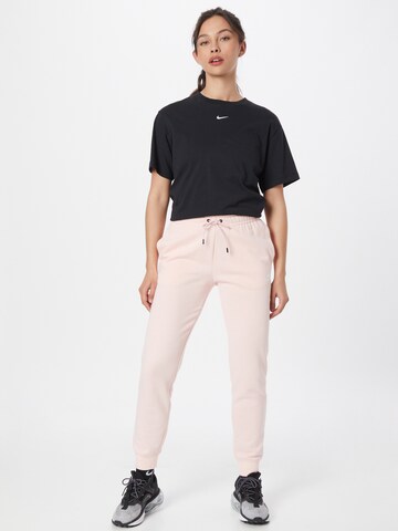 Nike Sportswear Zwężany krój Spodnie w kolorze różowy