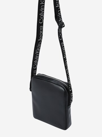 Sac à bandoulière Calvin Klein Jeans en noir