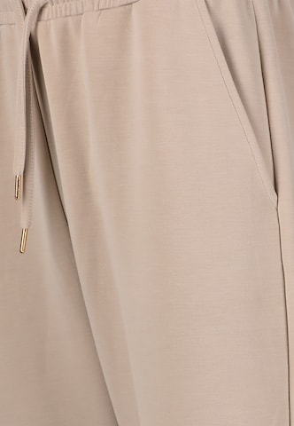 Athlecia Regular Sporthose 'Jacey' in Braun