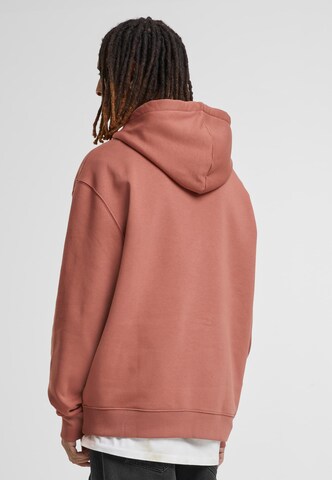 Karl Kani Sweatshirt in Braun