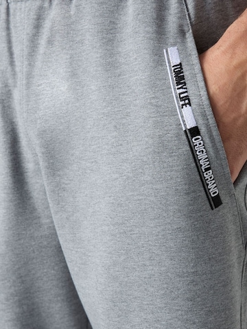 Wide leg Pantaloni di Tommy Life in grigio