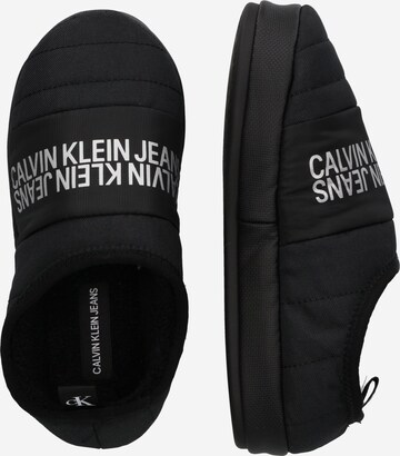 Papuci de casă de la Calvin Klein Jeans pe negru