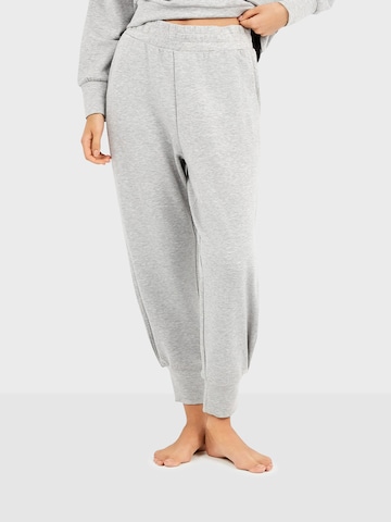 Gisela Zwężany krój Spodnie sportowe w kolorze szary: przód