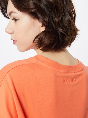 NU-IN - Camiseta en naranja