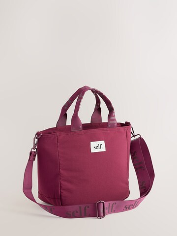 Borsa a mano di self. in rosso