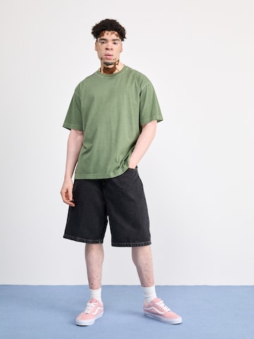 Carhartt WIP Avar lõige Teksapüksid 'Brandon', värv must