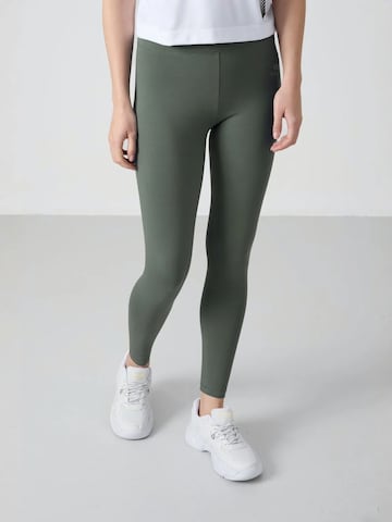 Tommy LifeSkinny Tajice 'Gamaschen' - zelena boja: prednji dio